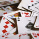 Describe the essential tactics for succeeding in the Solitaire game.